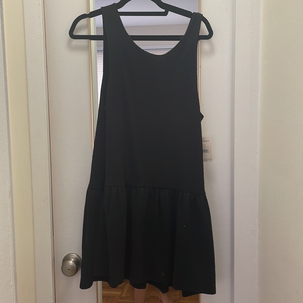Free People black mini dress. Size small. New with tags